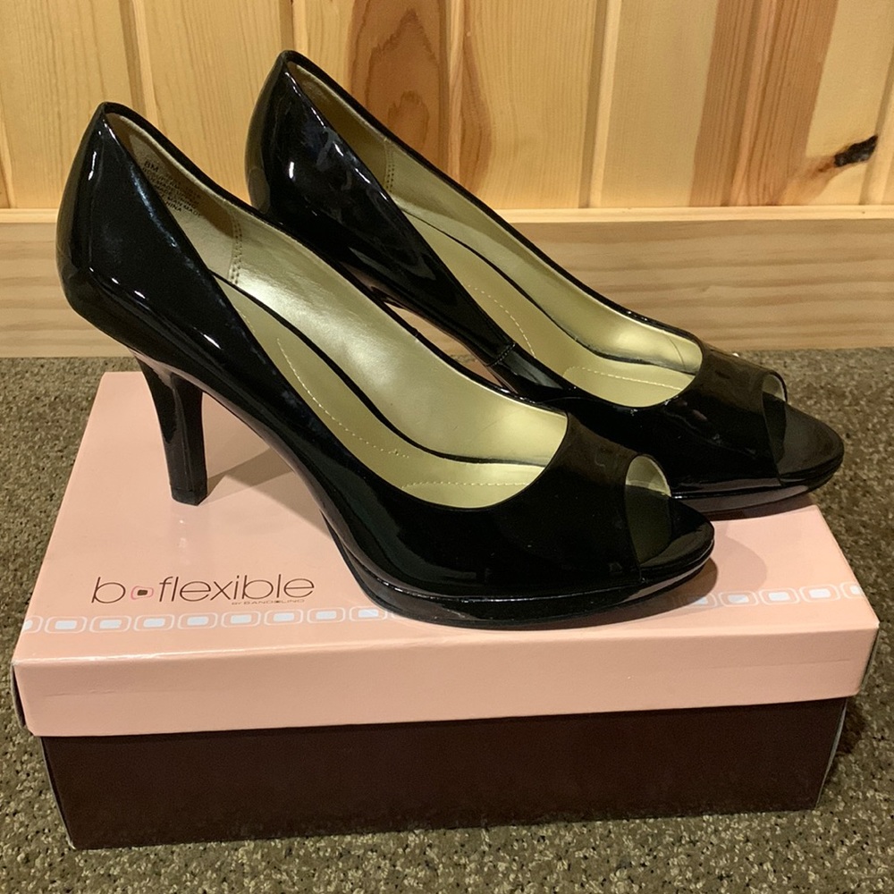 Beautiful black patent open toe heels. Worn once